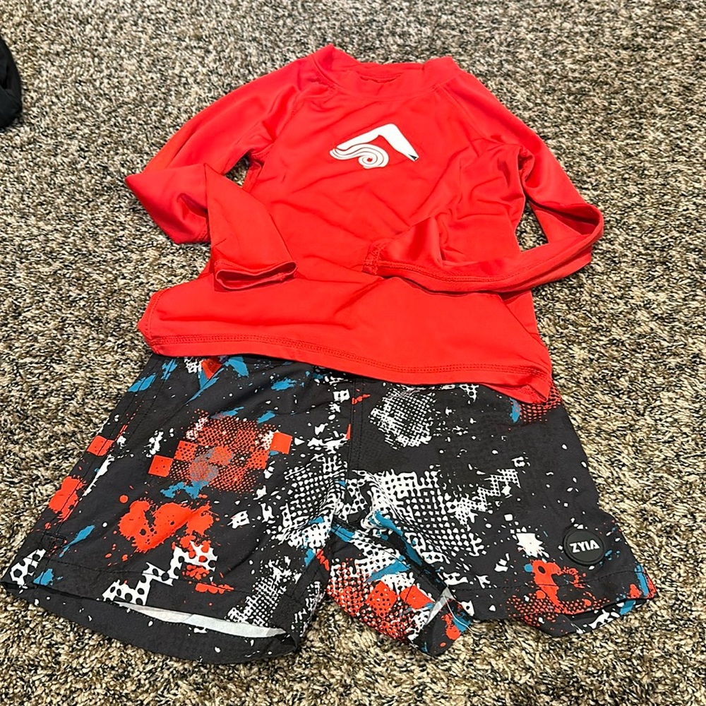 ZYIA swim trunks with Kanu top